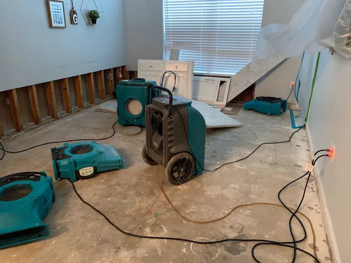 Dehumidifier in flood-cut room for Water Damage Restoration in Brenham